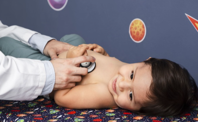 close up baby being examined with stethoscope